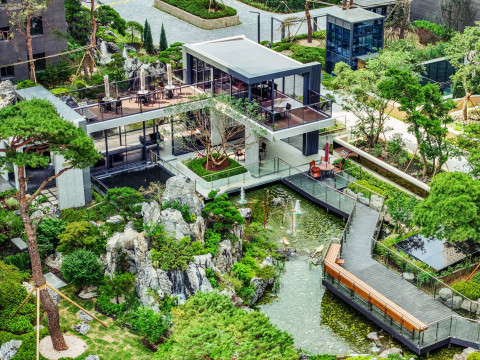 ‘2023 굿디자인 어워드’에 선정된 ‘롯데캐슬 리버파크 시그니처’의 자연풍경과 어우러진 티하우스 ‘카페아트리움’