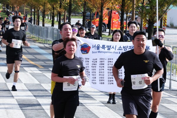 119메모리얼런 대회 참가자들이 전력 질주하고 있는 모습 [LG유플러스 제공]